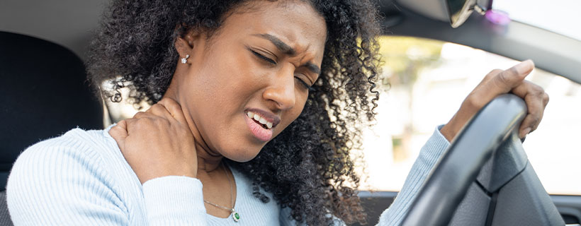 patient with neck pain in need of auto accident injury care in Anchorage